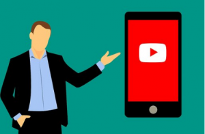 man pointing to smartphone